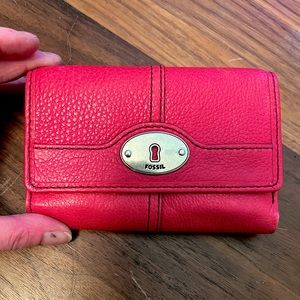 Fossil red pebbled leather wallet, black stitching, gold front button closure